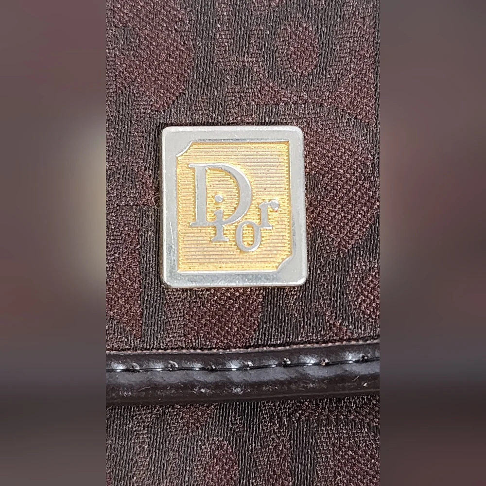 Christian Dior Trotter coin pouch.